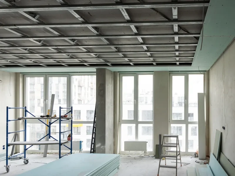 Commercial tenant space with new drywall going up during a fit-out