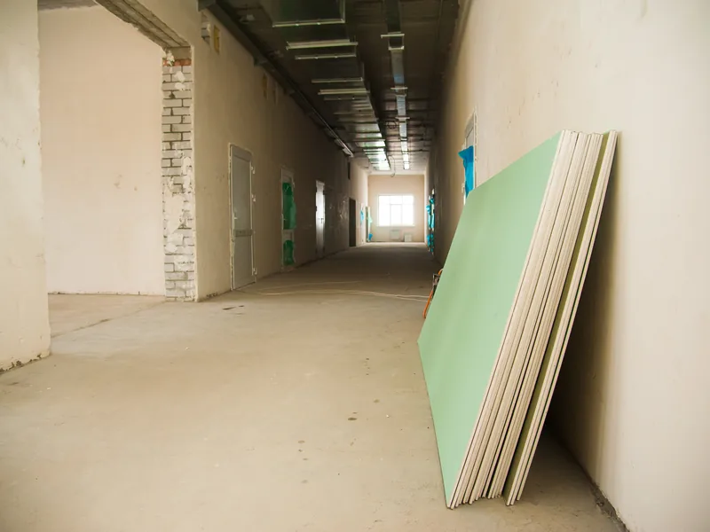 Stacked drywall panels of different types and thicknesses